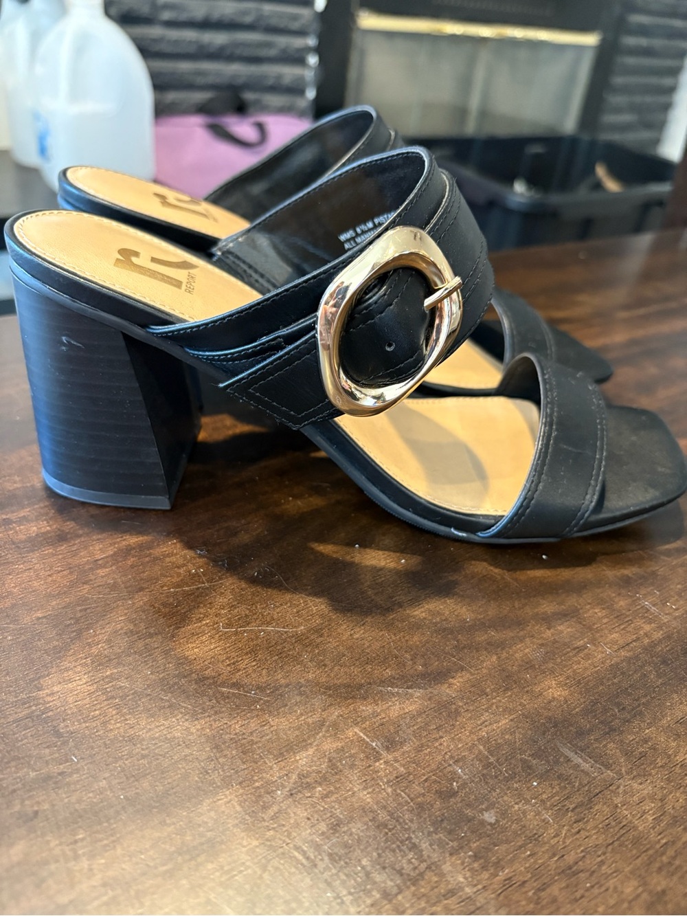 Report Black Heeled Slide Sandals with Gold Buckle